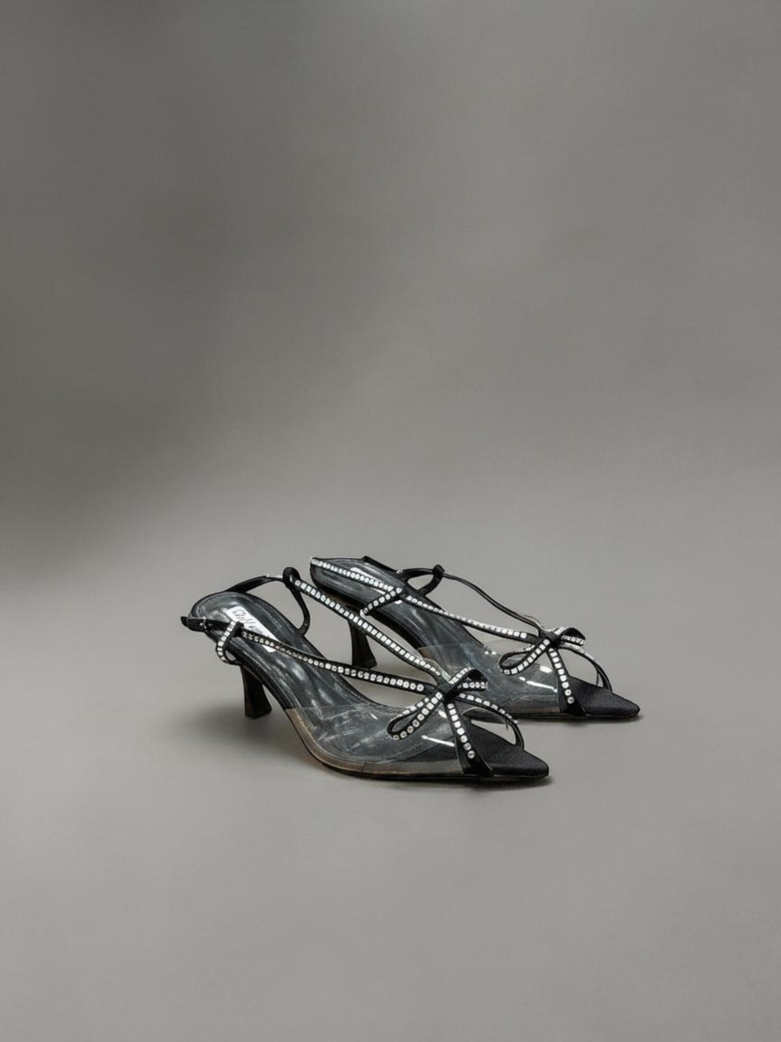 Day One Concept Store black strappy slingback heels with crystal bow details and clear PVC sides.