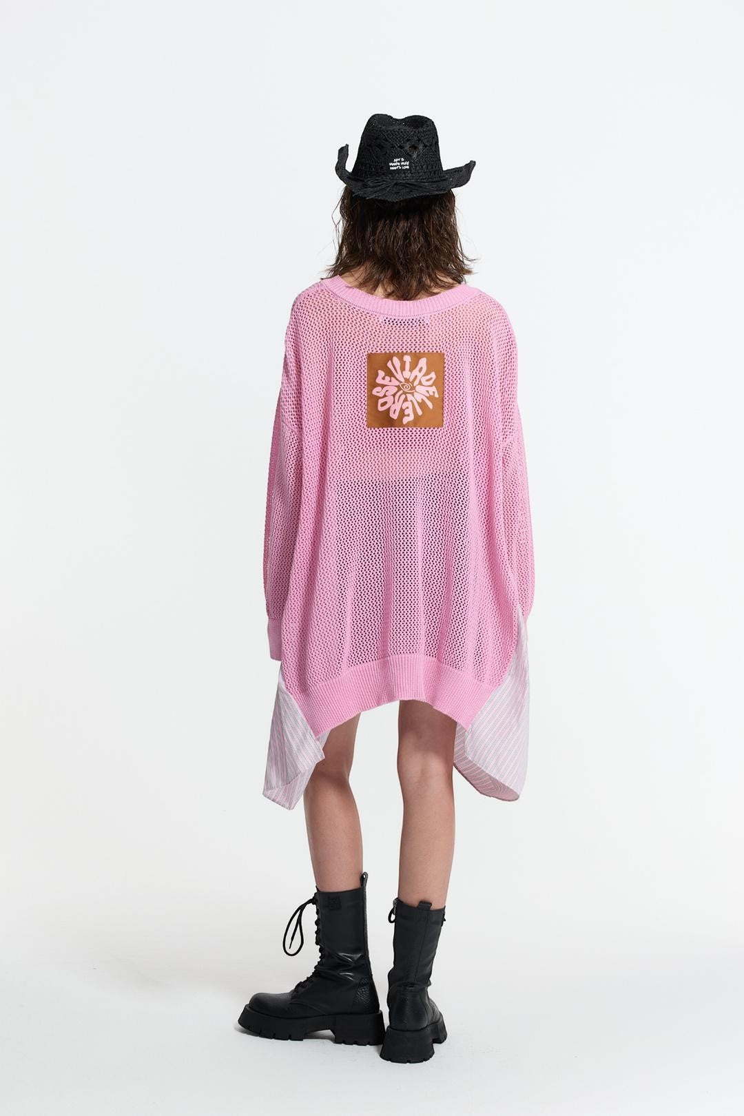 Day One Concept Store pink oversized mesh knit sweater with layered striped hem and graphic patch on back.