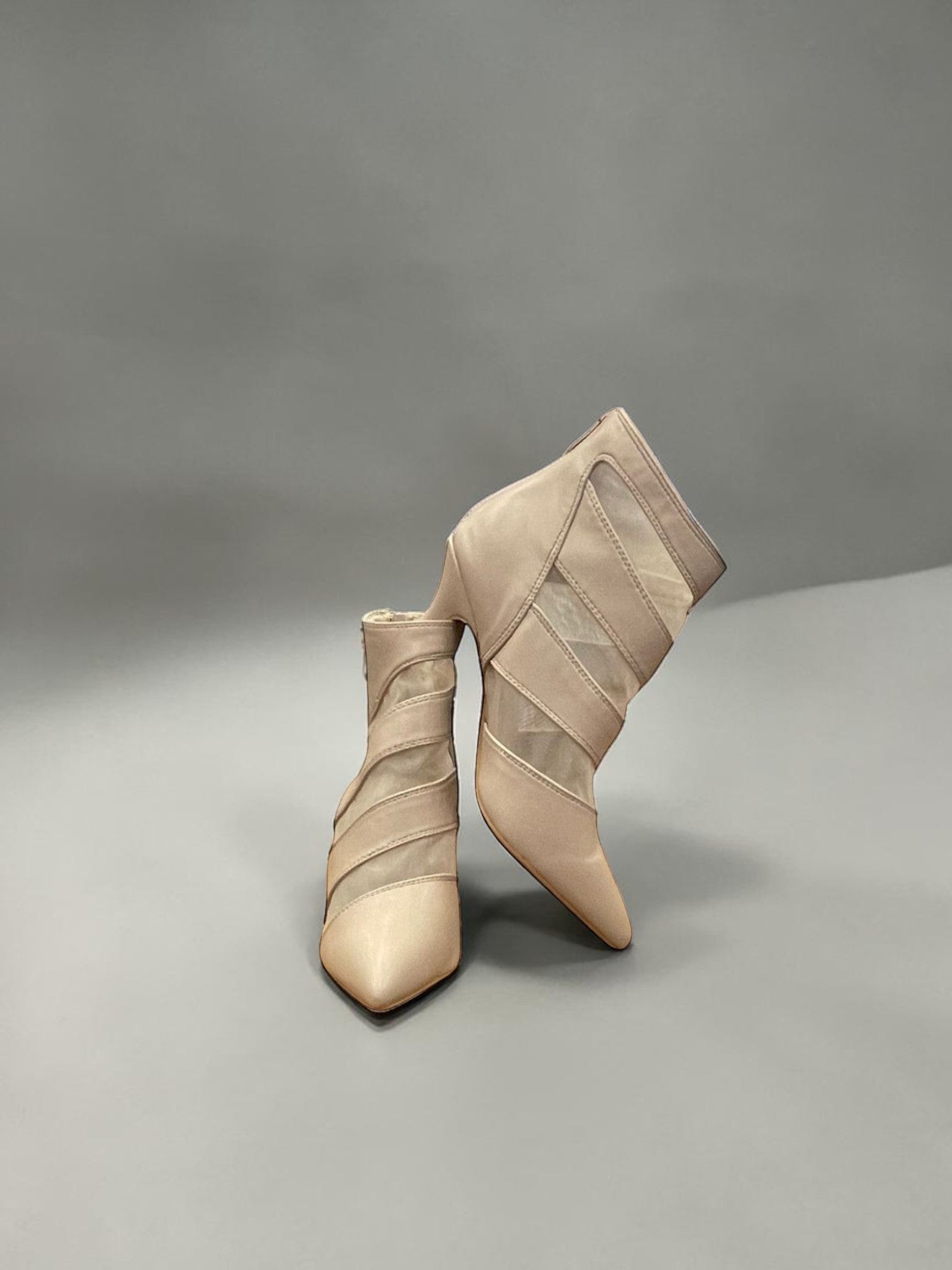 Day One Concept Store beige sock-fit ankle boots with mesh panels and pointed toe. Medium heel.