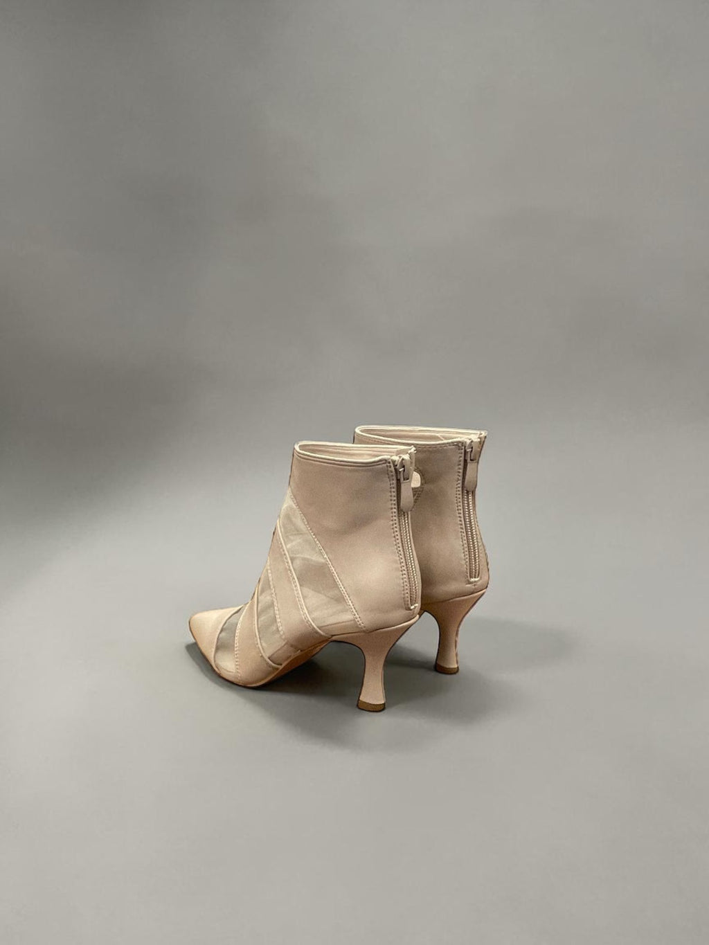 Day One Concept Store beige mesh sock booties with pointed toe and medium heel, featuring a back zipper.