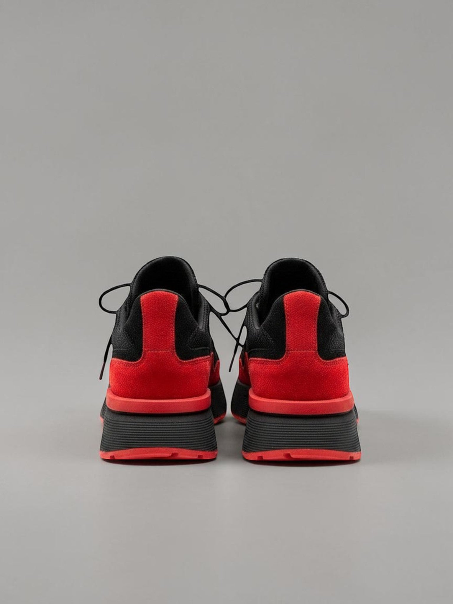 Day One Concept Store black and red chunky sneakers with platform sole and VDR logo.