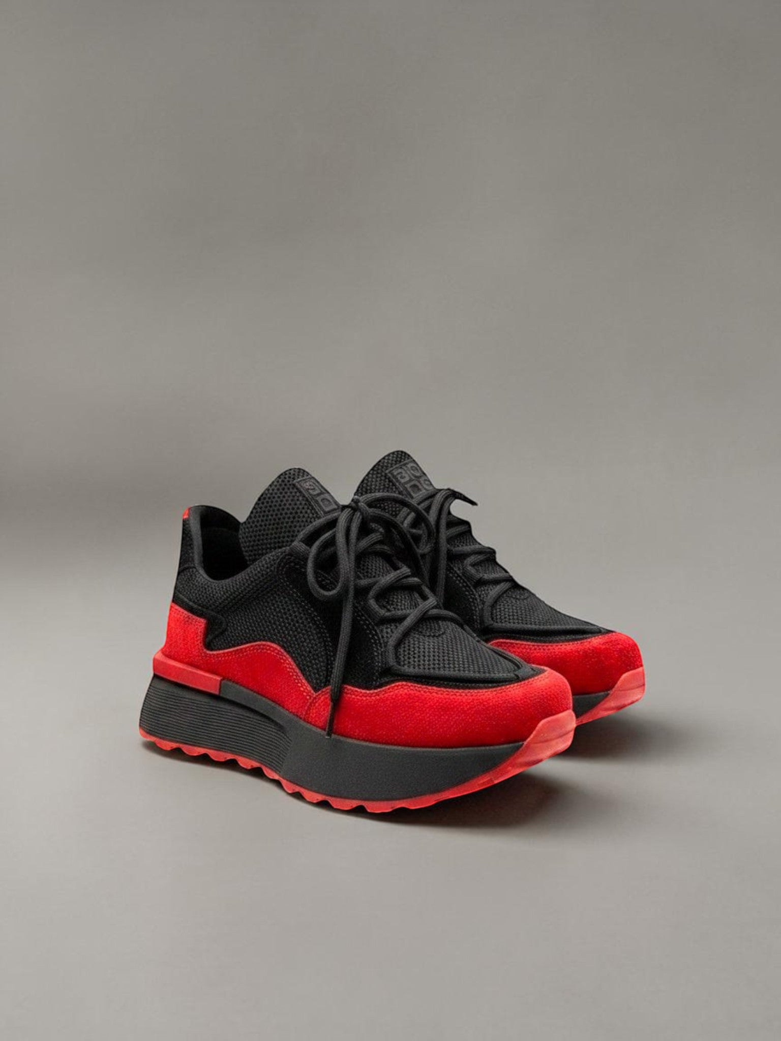 Day One Concept Store black and red chunky sneakers with platform sole and VDR logo.