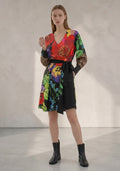 Day One Concept Store women's wrap dress with vibrant floral print, leopard print sleeves, V-neck, and tie belt.