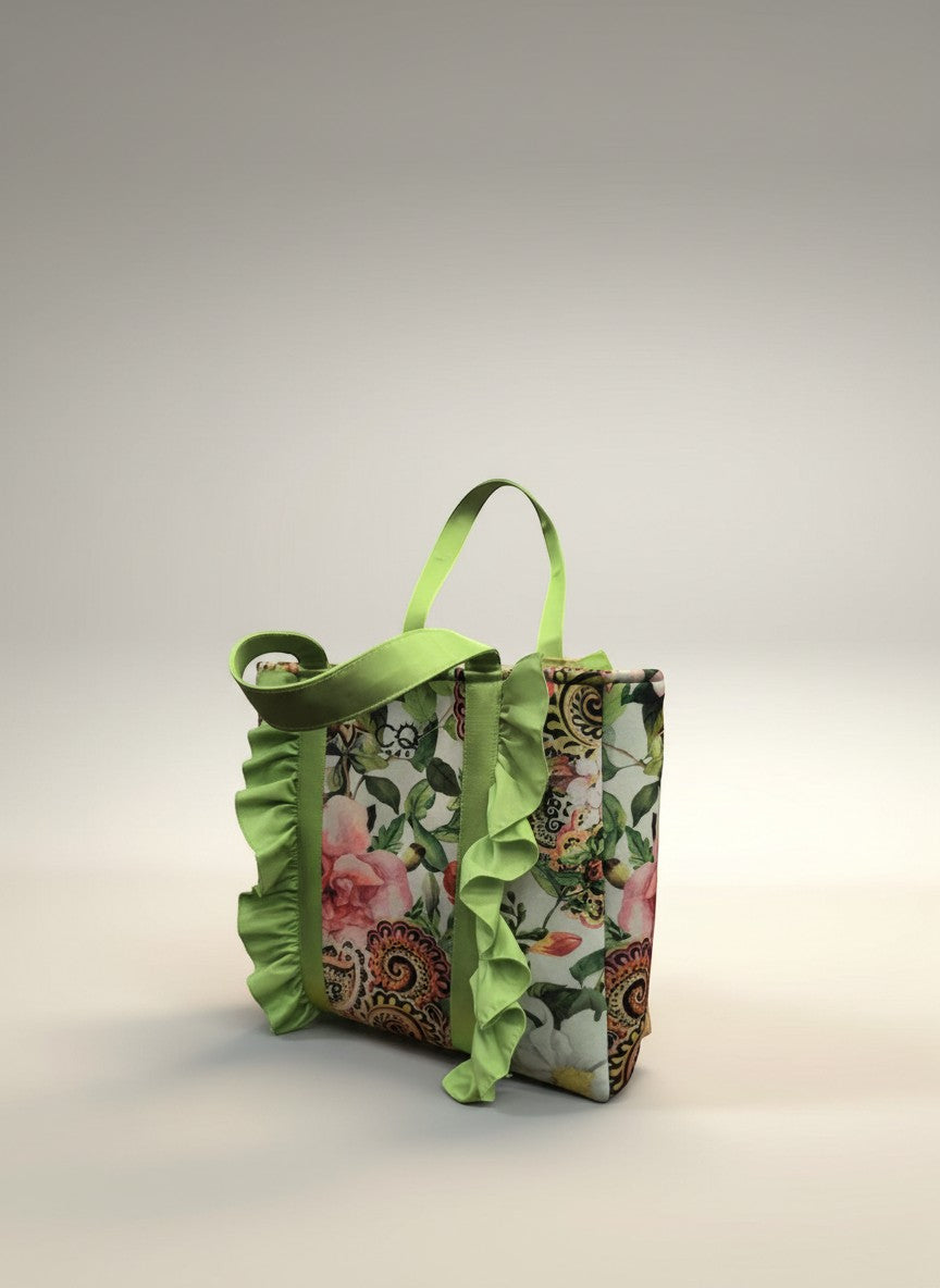 Day One Concept Store floral shopper bag with lime green handles and ruffled trim. Large tote bag with vibrant floral print.