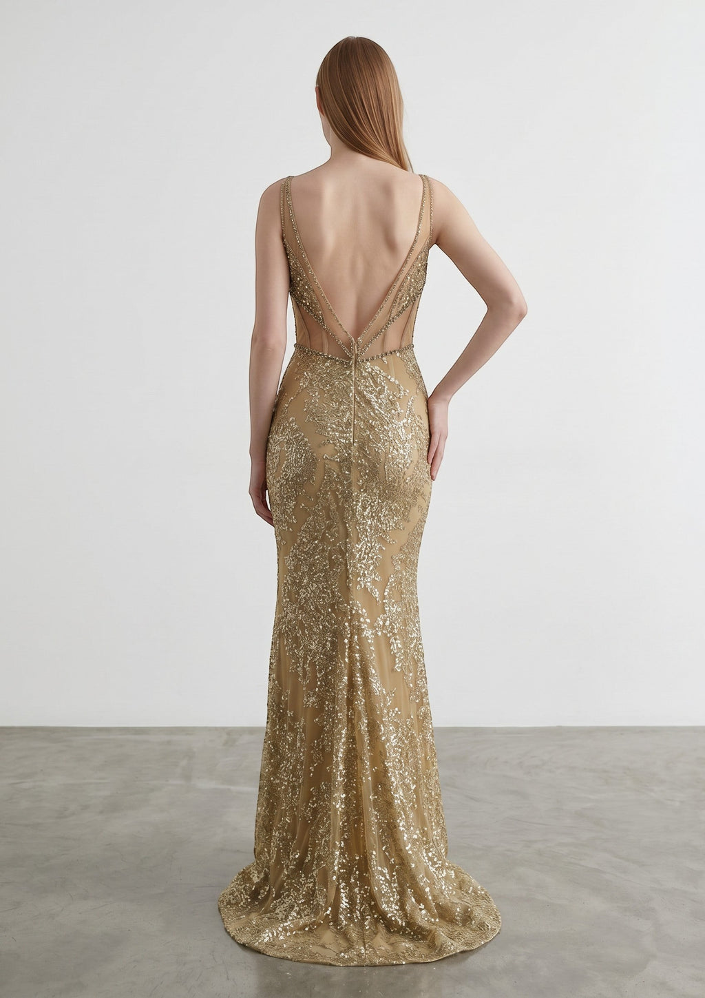 Day One Concept Store gold sequin mermaid evening gown with corset bodice, sweetheart neckline, and thin straps.