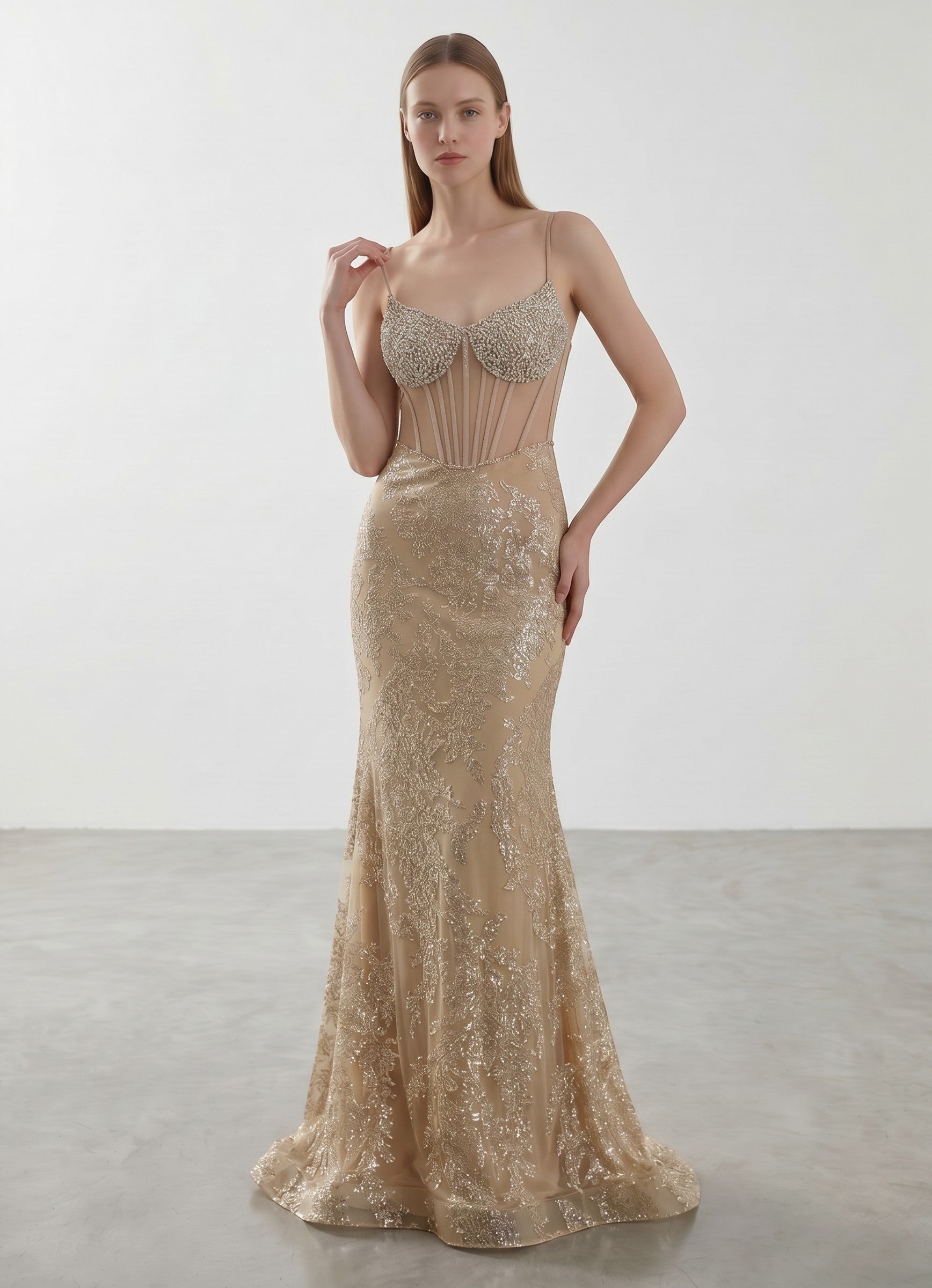 Day One Concept Store gold sequin mermaid evening gown with beaded corset and sweetheart neckline.
