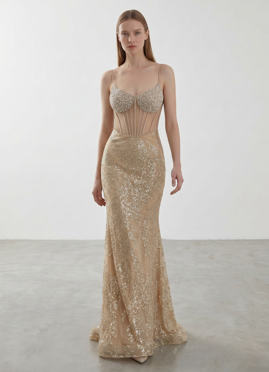 Day One Concept Store gold sequin and bead embellished mermaid evening gown with sheer corset bodice and sweetheart neckline.
