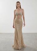 Day One Concept Store gold sequin and bead embellished mermaid evening gown with sheer corset bodice and sweetheart neckline.