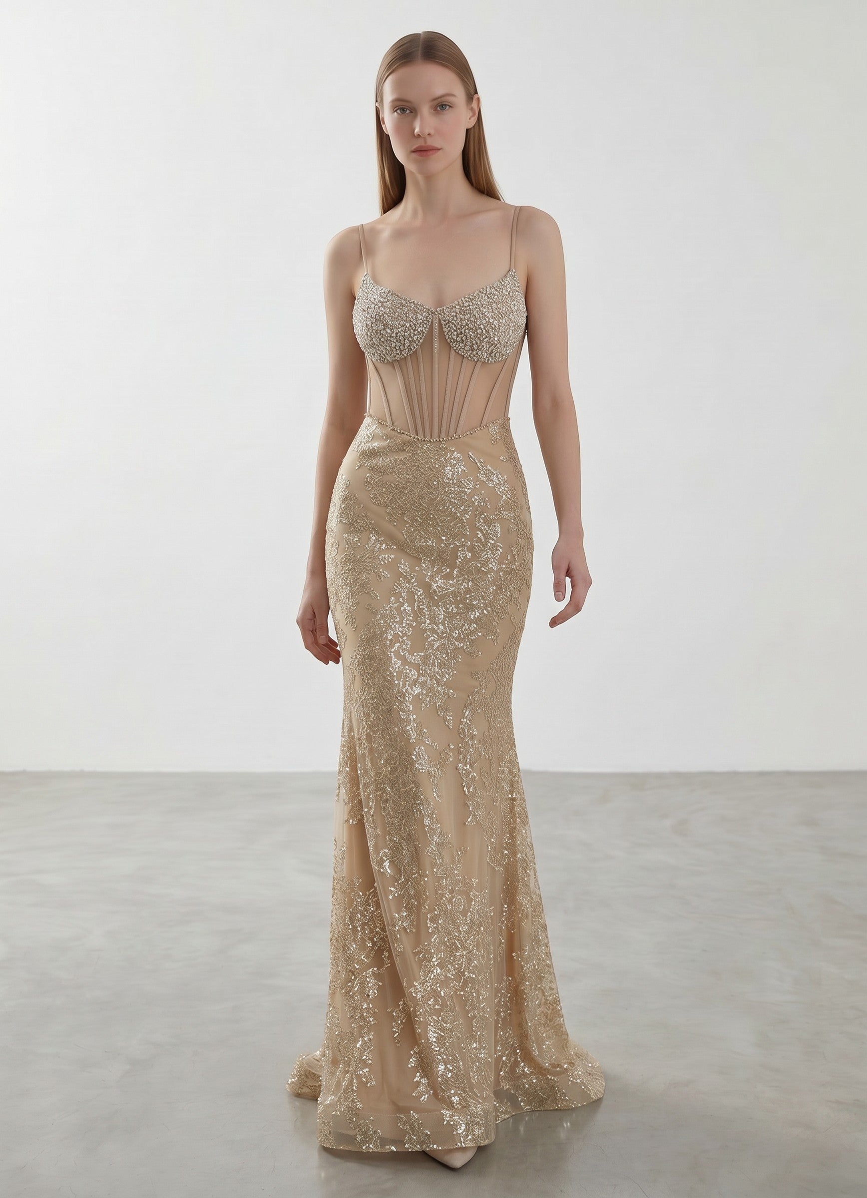Day One Concept Store gold sequin and bead embellished mermaid evening gown with sheer corset bodice and sweetheart neckline.