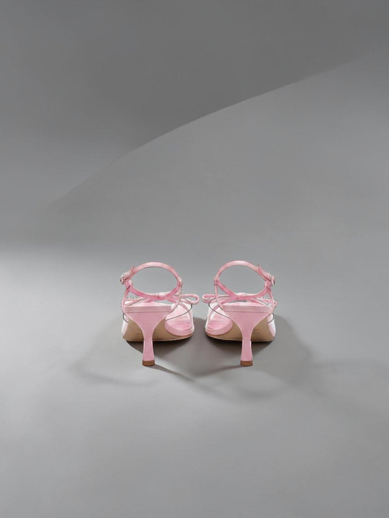 Day One Concept Store pink slingback sandals with bow and rhinestone details, kitten heel, and ankle strap.
