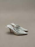 Day One Concept Store silver slingback heels with pointed toe, stiletto heel, and intricate rhinestone embellishments.